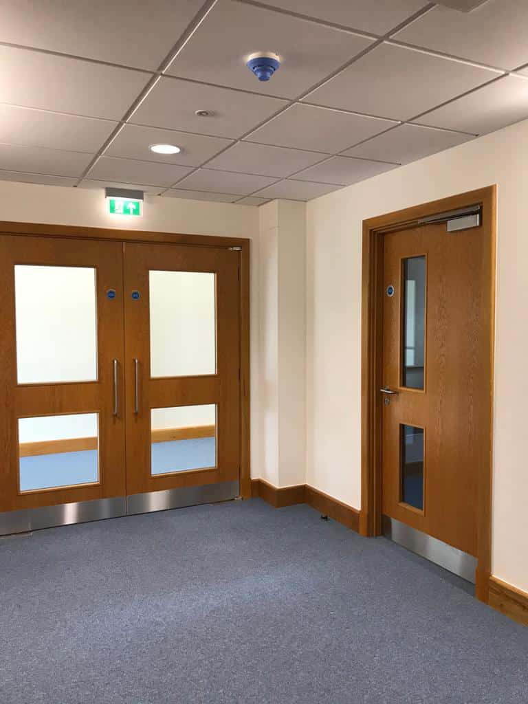 Oak fire doors with emergency lighting