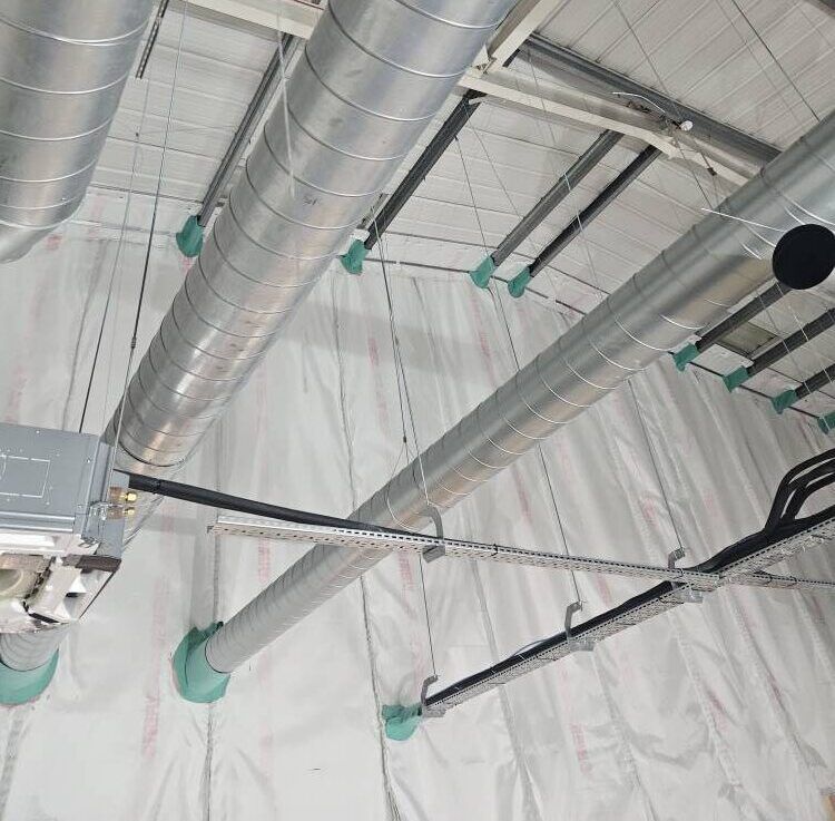 Ductwork with intumescent fire collars